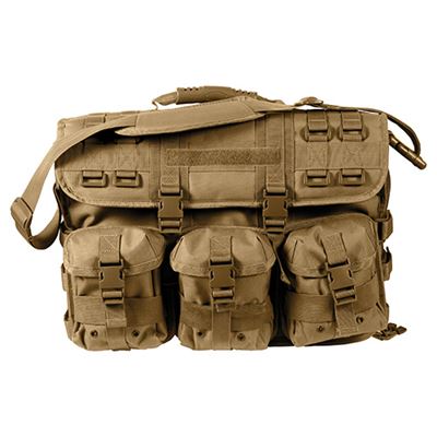 MOLLE bag over his shoulder at the laptop COYOTE