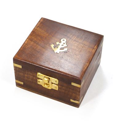 Brass compas in wooden box