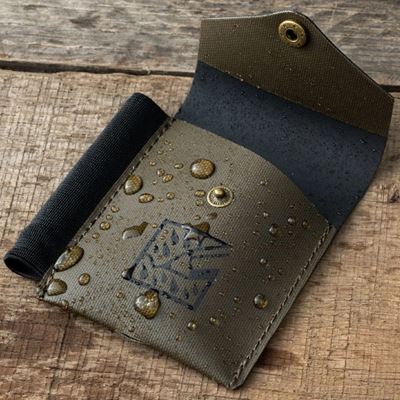 Monsoon case for a small notebook with a pencil